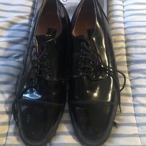 Men’s black patent leather shoes